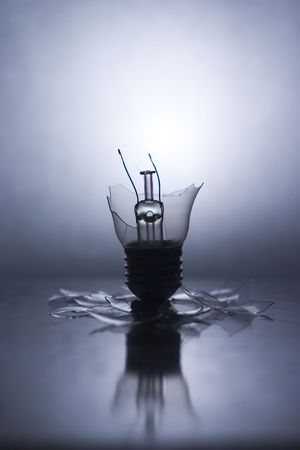 Broken Lightbulb with backlight and reflection