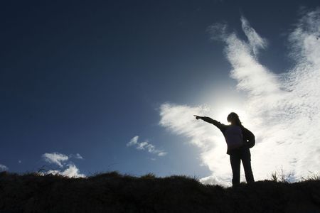 silhouette of Woman pointingの写真素材