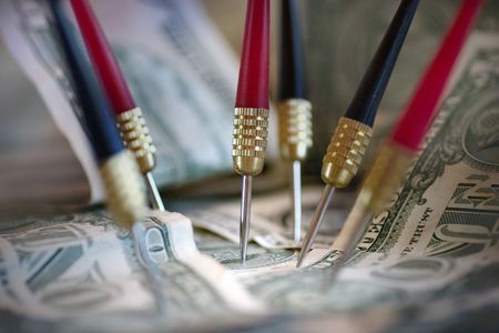 US Dollars and darts