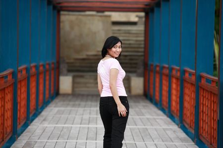 Beautiful Asian woman looking backの写真素材