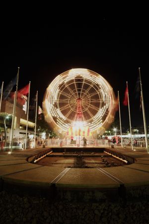 Spinning Ferris wheel during festival in Queensland, Australiaの写真素材