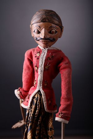 Isolated Indonesian traditional puppet shot over gray backgroundの写真素材
