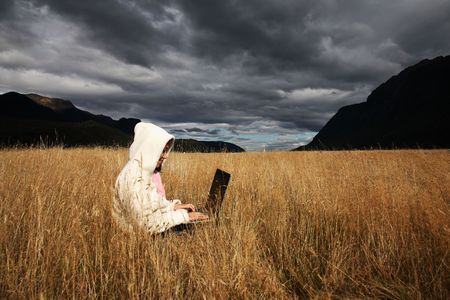 Woman working with laptop at New Zealandの写真素材