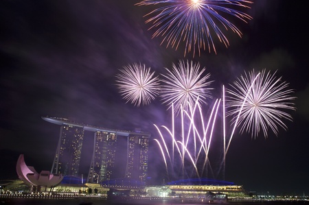 Fireworks over Marina Bay Hotel and Resort during during Singapore National Day Parade 2011のeditorial素材