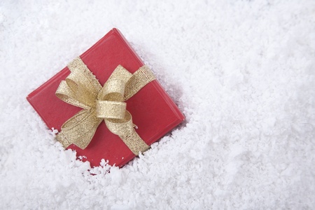 Christmas present with snow background