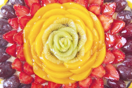Close-up of a beautiful fruit dessert cake の写真素材