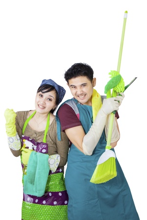 Couple hold cleaning tool on white backgroundの写真素材