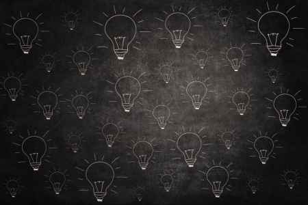 Blackboard with lightbulbs picture as backgroundの写真素材