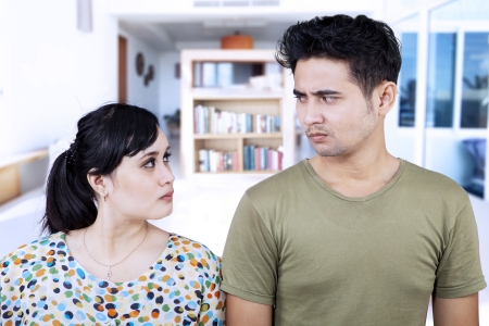 Close-up of angry couple at homeの写真素材