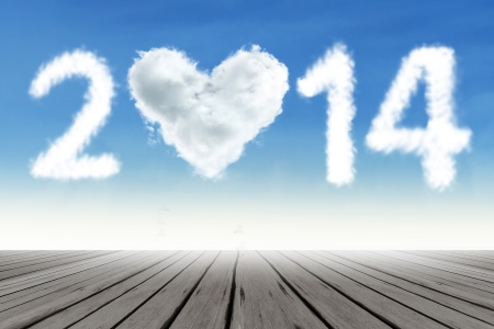 Heart shaped cloud of new year 2014 on the blue skyの写真素材
