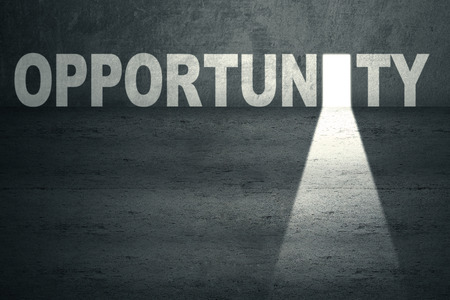 Opened opportunity door with bright lightの写真素材