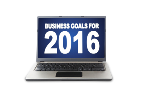 Image of laptop computer with hand written of business goals for 2016, isolated on white backgroundの写真素材
