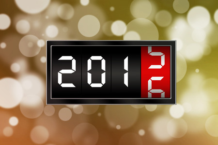 Happy new year concept with numbers 2016 and golden defocused background