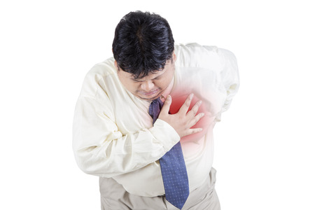 Image of businessman having heart attack, isolated on the white background