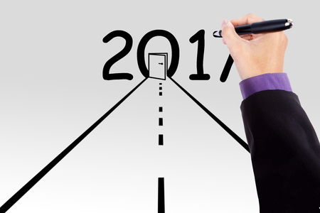 Image of hand drawing straight road with door and numbers 2017, isolated white background