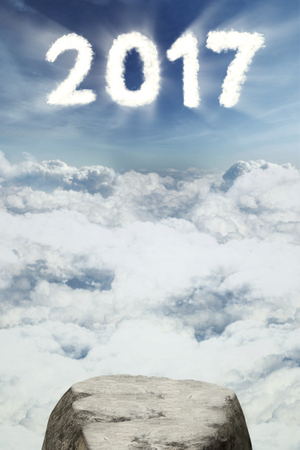 Image of empty stone with number 2017 in the clear sky, concept of better new future for 2017の写真素材