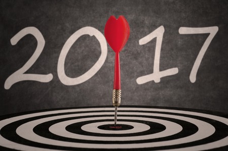 Picture of bullseye hit the target on dartboard with number 2017