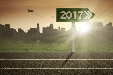 Image of running track with numbers 2017 on the sign board in the morning