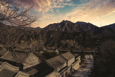 Beautiful landscape of ancient village house with view of Great Wall of China on the hillのeditorial素材