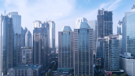 JAKARTA, Indonesia. July 10, 2017: Aerial view of modern skyscrapers of apartment, office bank, hotel, and office buildings in Jakartaのeditorial素材