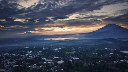 Aerial view of a mountain valley with beautiful cloud in sunrise time at Semarang, Indonesiaの写真素材