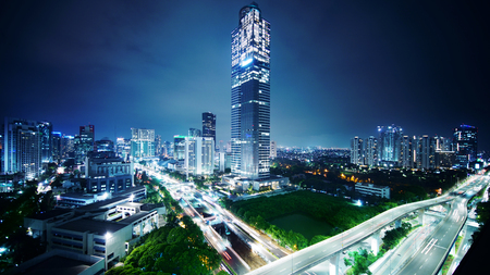 JAKARTA, Indonesia. November 06, 2017: Panorama Jakarta city with skyscraper building and highway at night sceneのeditorial素材