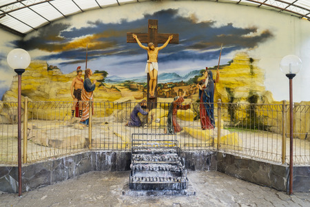 Picture of crucified Jesus Christ sculpture on wooden cross. Shot on the churchのeditorial素材