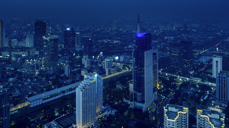 JAKARTA - Indonesia. August 15, 2018: Aerial scenery of cityscape Jakarta with skyscrapers at night timeのeditorial素材