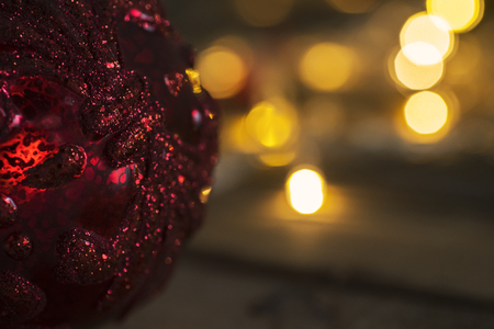 Closeup of Christmas ball ornament with blurred twinkling light backgroundの写真素材