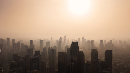 JAKARTA - Indonesia. October 12, 2018: Silhouette of Jakarta cityscape at dusk time with air pollutedのeditorial素材