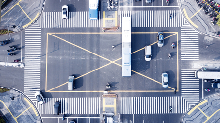 JAKARTA - Indonesia. October 10, 2018: Aerial view of traffic on intersection with crosswalk in...
