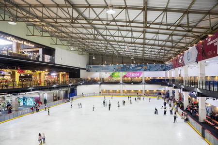 JAKARTA - Indonesia. October 15, 2018: Tourists playing ice skating at modern mall. Shot in Jakarta, Indonesiaのeditorial素材