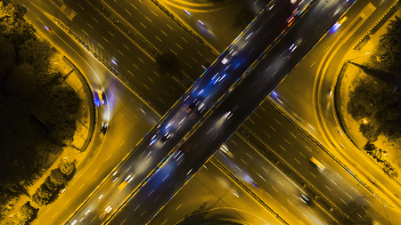 JAKARTA - Indonesia. October 22, 2018: Aerial view of night traffic on overpass tollway and road interchangeのeditorial素材