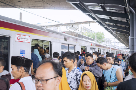 JAKARTA - Indonesia. November 09, 2018: Crowded people with train that just arrived at a stationのeditorial素材