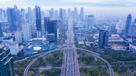 JAKARTA, Indonesia - November 27, 2018: Aerial view of Sudirman highway near Semanggi interchange at misty morningのeditorial素材