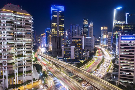 JAKARTA - Indonesia. January 23, 2019: Aerial view of skyscrapers with hectic traffic at night time in South Jakarta, Indonesiaのeditorial素材