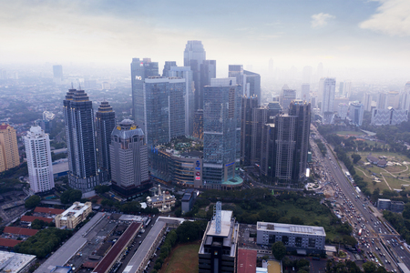 JAKARTA - Indonesia. February 18, 2019: Drone view of high buildings at misty morning in Jakarta cityのeditorial素材