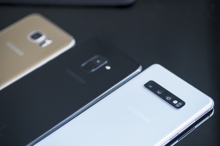 JAKARTA - Indonesia. March 21, 2019: Back view of three Samsung Galaxy smartphone on the tableのeditorial素材