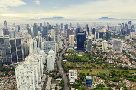 JAKARTA - Indonesia. March 29, 2019: Aerial view of office buildings in Jakarta city at misty morningのeditorial素材