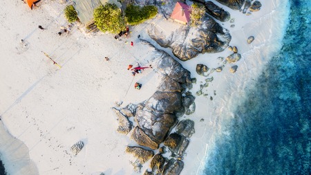 Bali - Indonesia. April 09, 2019: Aerial view of tourists enjoys holiday on the Gili Kedis island. Shot in Bali, Indonesiaのeditorial素材