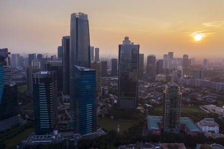 JAKARTA - Indonesia. June 25, 2019: Drone view of skyscrapers in Kuningan CBD area at sunset timeのeditorial素材