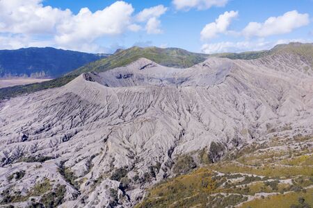 Beautiful scenery of crater Bromo volcano under blue sky in East Java, Indonesiaの写真素材