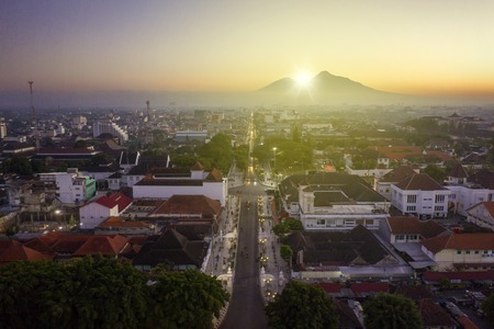 Yogyakarta - Indonesia. July 18, 2019: Beautiful sunrise at zero point kilometer of Yogyakarta city...