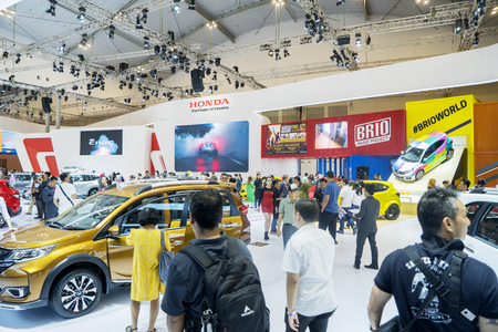 Tangerang - Indonesia. July 24, 2019: Honda booth with crowded visitors in hall of Gaikindo Indonesia International Auto Show (GIIAS) 2019のeditorial素材
