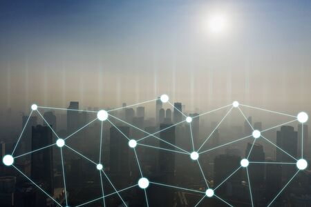 Aerial view of Jakarta city during sunrise with connecting dots for networking and communications