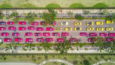 JAKARTA - Indonesia. October 01, 2019: Top view of crowded luxury Ferrari cars on the road with red and yellow colorsのeditorial素材