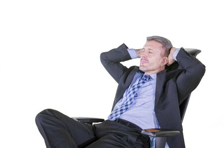 Closeup caucasian man napping on armchair looking very tired, isolated on white backgroundの写真素材