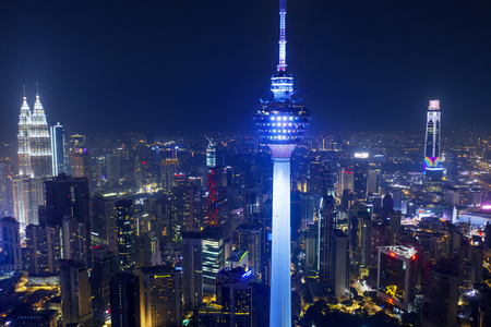 KUALA LUMPUR - Malaysia. November 12, 2019: Aerial view of Kuala Lumpur city skyline with illuminated KL Tower and TRX Tower buildings in the distanceのeditorial素材