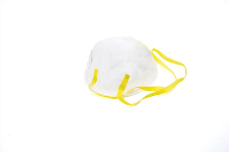 Medical mask for corona pandemic prevention, isolated on white backgroundの写真素材