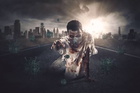 Scary zombie with face mask and coronavirus on the roadの写真素材